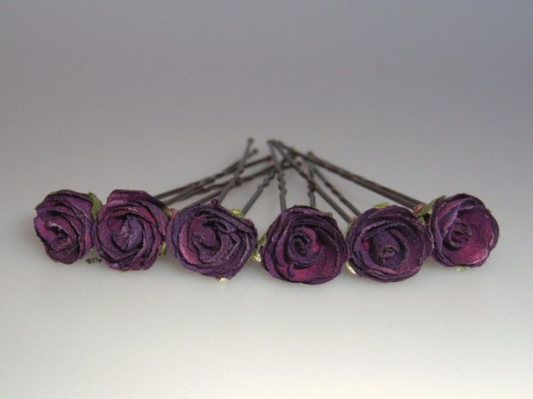 Deep violet parchment rose hair flowers