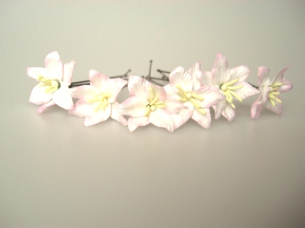 pink and ivory lily hair flowers