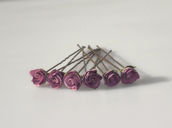 small semi-open lilac roses